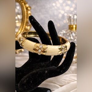 Elegant Gold and Cream Bangle Bracelet